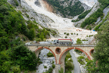 bridge in the carrara marble mountains
