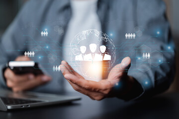 Businessman showing virtual graphic human icon HR human resources recruitment team Staff management...