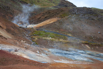 Krýsuvík, popular with hikers, this area features geothermal fields, hot springs & yellow, green & red soil.