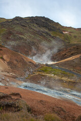 Krýsuvík, popular with hikers, this area features geothermal fields, hot springs & yellow, green & red soil.