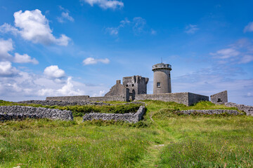 Stone ruins of the castle and lighthouse at Inishmore island, Galway