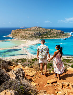 Crete Greece, Balos lagoon on Crete island, Greece. Tourists relax at the crystal clear ocean of Balos Beach. Greece