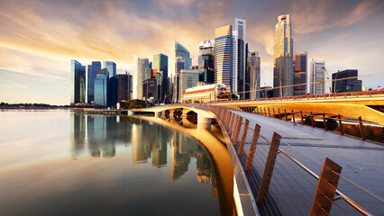 Singapore with bridge and skyscraprest at sunrise