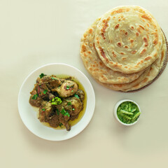 Fresh homemade Chicken Roust with delicious Parotta