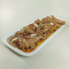 A recipe for roasted chicken legs decorated with a white background.