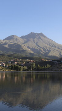 view of the lake and mountains in the background