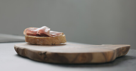 bruschettas with panchetta, ricotta and fig marmalade on ciabatta bread