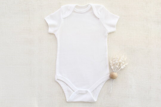 baby bodysuit mockup for your design.