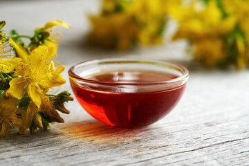 Red oil made from St. John's wort flowers