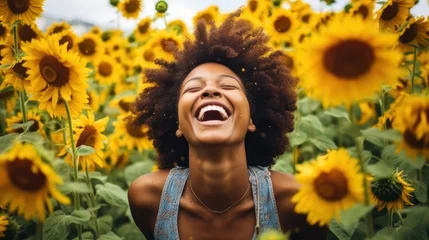 Rolgordijnen Photo of black woman in sunflower field © GMZ