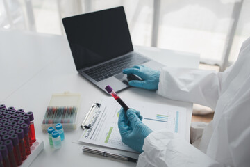 Fototapeta premium The laboratory is used for scientific research to test and research therapeutic vaccines, lab assistants collect blood samples from patients and perform chemical reactions. Laboratory concept.