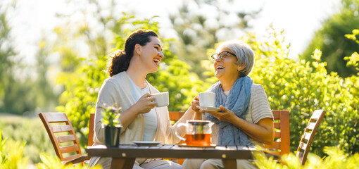 women drinking tea in the garden