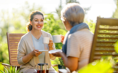 women drinking tea in the garden