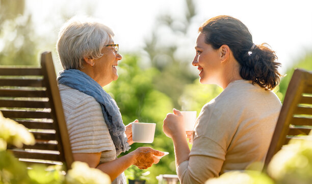 women drinking tea in the garden