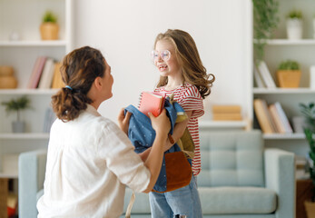 Happy family preparing for school