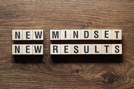 New mindset new results - word concept on building blocks, text