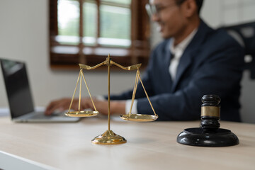 Male lawyer businessman sitting in the office doing legal work.