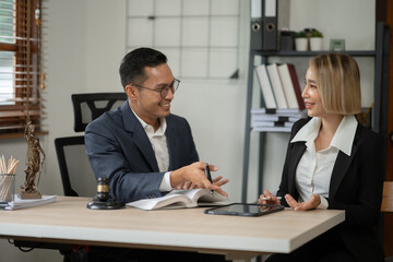 Lawyers having  Concepts of  Legal services at the law office work Legal advice online on computer labor law