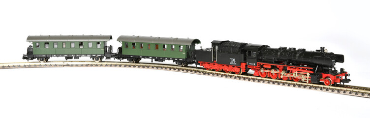 toy steam locomotive with wagons. model train isolated on white