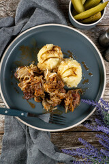 Fried liver with onion.