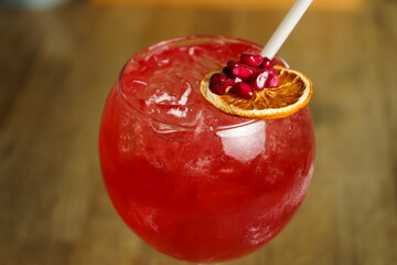 Close up of an alcoholic cocktail, spritz drink on a table