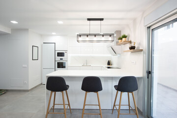 modern kitchen perfectly equipped with its appliances in a house 