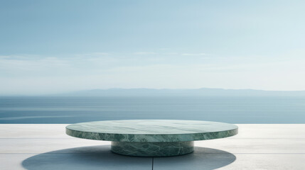 Fototapeta na wymiar green marble oval table on terace with a view of the sea