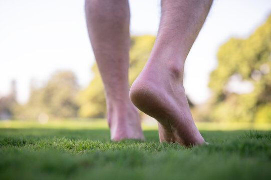 Close Up Of Bare Feet  Walking On Grass, Moving Forward Concept, Business Growth, Active, Relaxing