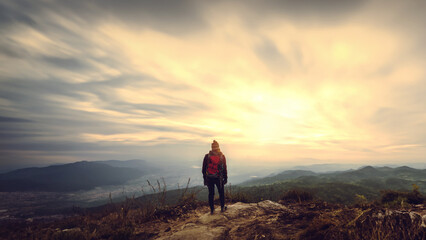 Fototapeta premium women asians travel relax in the holiday. Admire the atmosphere landscape on the Moutain. Mountain Park happily. In Thailand