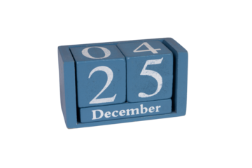 a wooden calendar with the date of Christmas