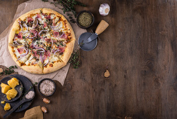 Italian pizza carbonara with bacon and herbs