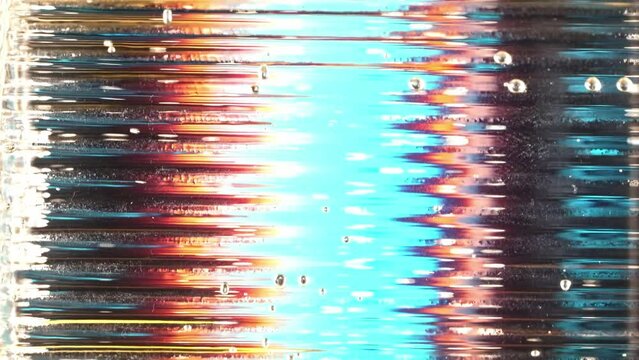 Natural glass prism with digital reflections of bright vibrant colours like on HDR displays ex. Retina.
Colorful abstract texture bubbles smooth surface decorative interior 4K loop