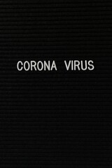 Vertical black spongy board with a text "corona virus" for background
