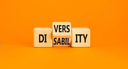 DEI Diversity or disability symbol. Concept words Diversity disability on wooden block. Beautiful orange table orange background. Business diversity disability concept.