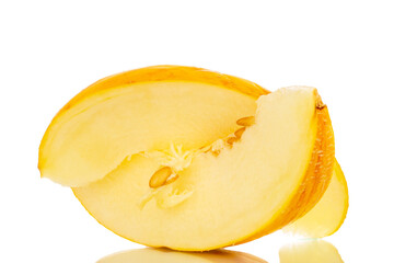 Two slices of yellow melon, macro, isolated on white background.