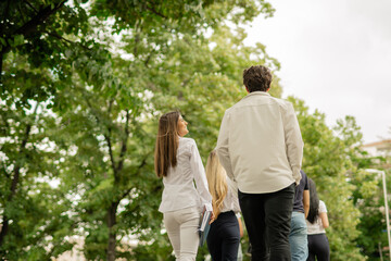 Fototapeta premium High school students holding books