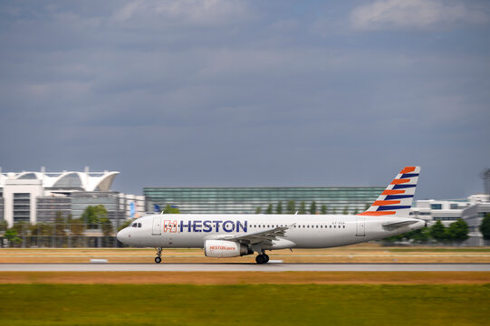 Heston Airlines Airbus A320-232 with the aircraft registration LY-CCK is starting on the southern runway 26L of the Munich airport MUC EDDM.