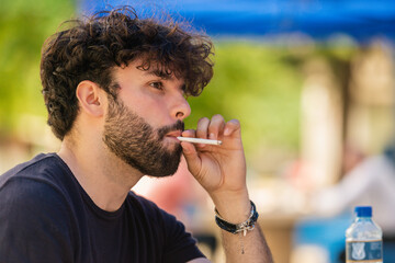 Portrait of a man smoking a cigarette