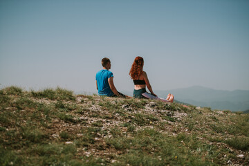 Fototapeta premium Sitting at the top of the meadow