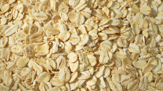 Nutritious rolled oats, a breakfast staple, viewed through a probe lens. Their textured essence and fiber-rich composition captured, enticing a wholesome start to the day.
