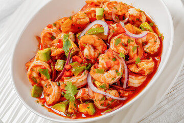 mexican shrimp cocktail salad in a bowl, top view