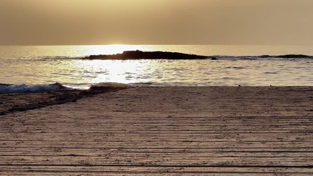 Cala Capit&aacute;n, a Spanish playa in Costa Blanca. Orihuela Costa / Cabo Roig / Playa Flamenca. Beach and sea  in sunrise.