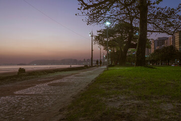 City of Santos, Brazil. Walk to the beach and gardens at sunset.
