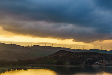 Obraz premium Andalucia at sunset with wind turbines, Spain