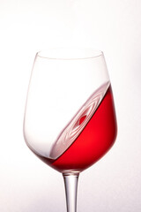 Red Drink Splash Inside a Glass: Refreshing and Eye-Catching
