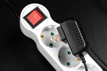 Failure to connect different incompatible American electrical plug and  European splitter socket