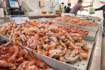 Shrimps and seafood for sale in the Olhao market.