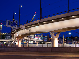 Gothenburg, Sweden, May 30, 2023: Curved and illuminated road viaduct in Gothenburg in blue hour