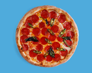 appetizing pepperoni pizza with jalapeno on a blue background, studio shot