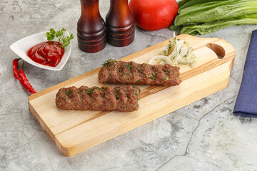 Kebab with beef served onion